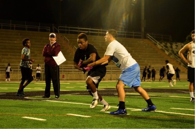 Jaguar football holds an evening tryout in the new DeVore Stadium after the completion of their season.