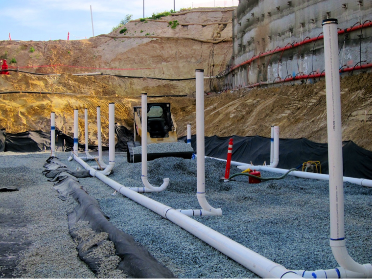 PIPES: Piping is laid to redirect 3 million gallons of groundwater away from the Prop R construction site. If left, the water could have eroded the fieldhouse building’s foundation.