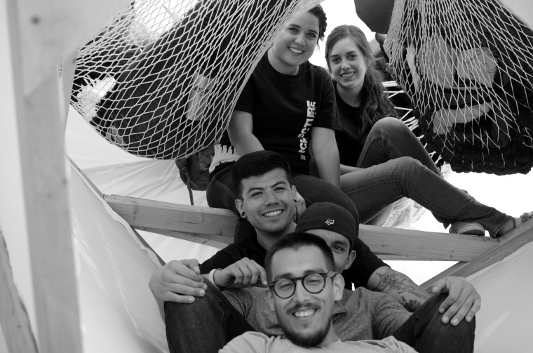 Team Helios sits in the entrance of their structure.