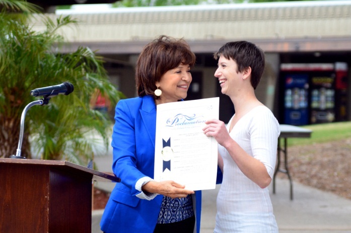 Chula Vista Councilwoman Mary Salas presents proclamation to SVO VP Crystal Higgs 