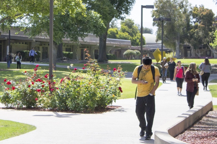 photo of students walking around campus