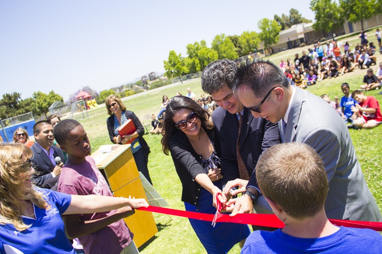 photo of VIPs cutting ribbon