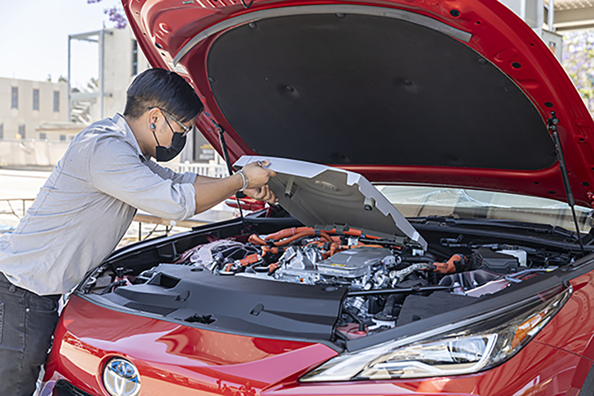 Auto Technology student conducting an engine analysis.