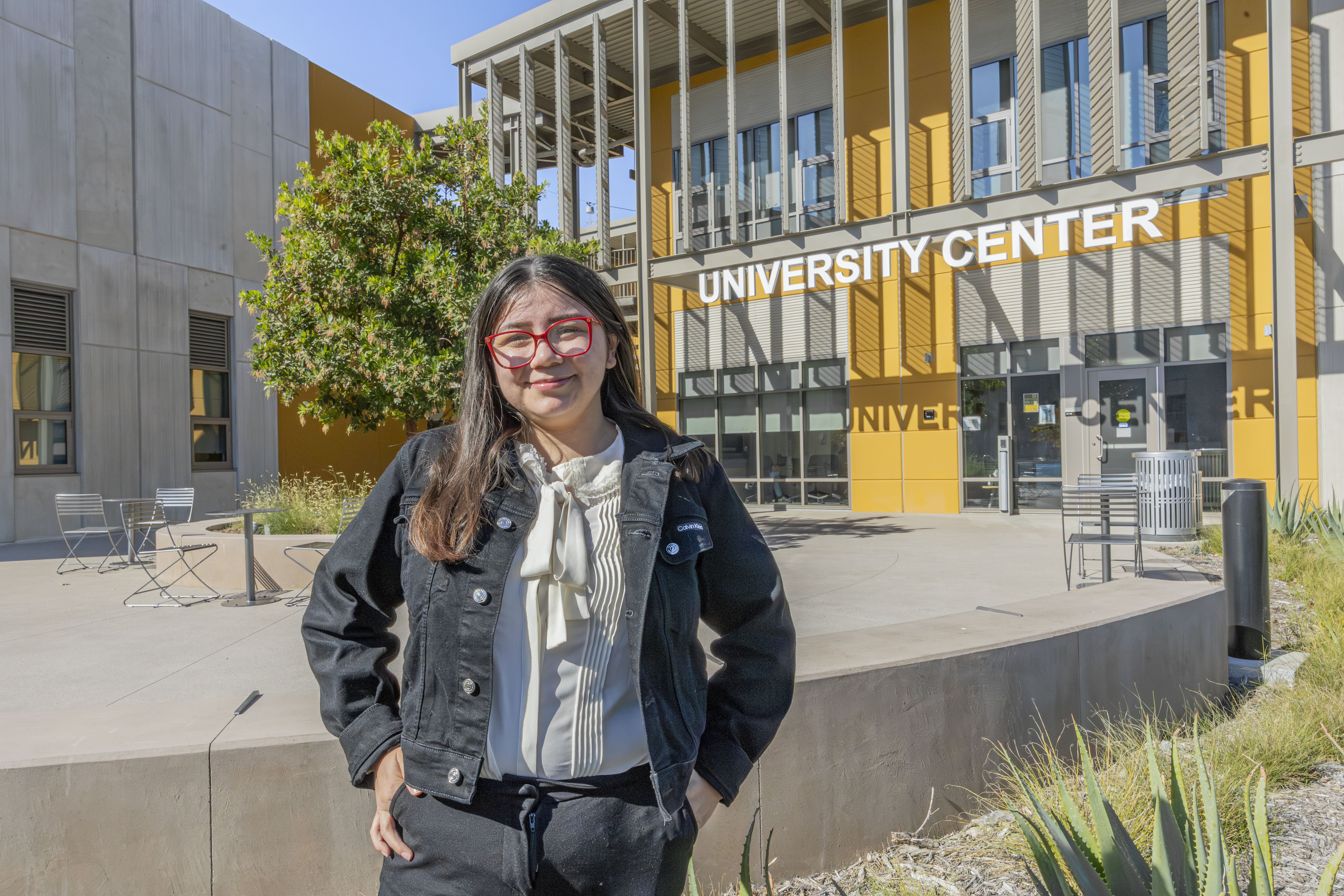 Photo of Valeria Porraz in front of the Southwestern College University Center.