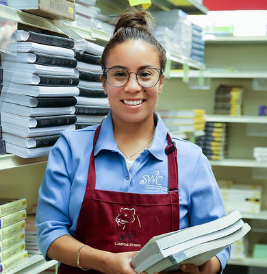 Smiling College Bookstore employee