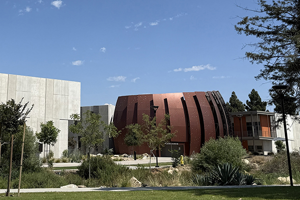 Southwestern College Planetarium building amongst the campus greenery.