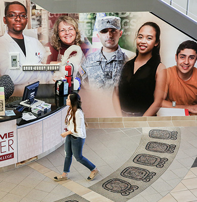 Female student inside the Student Services building.