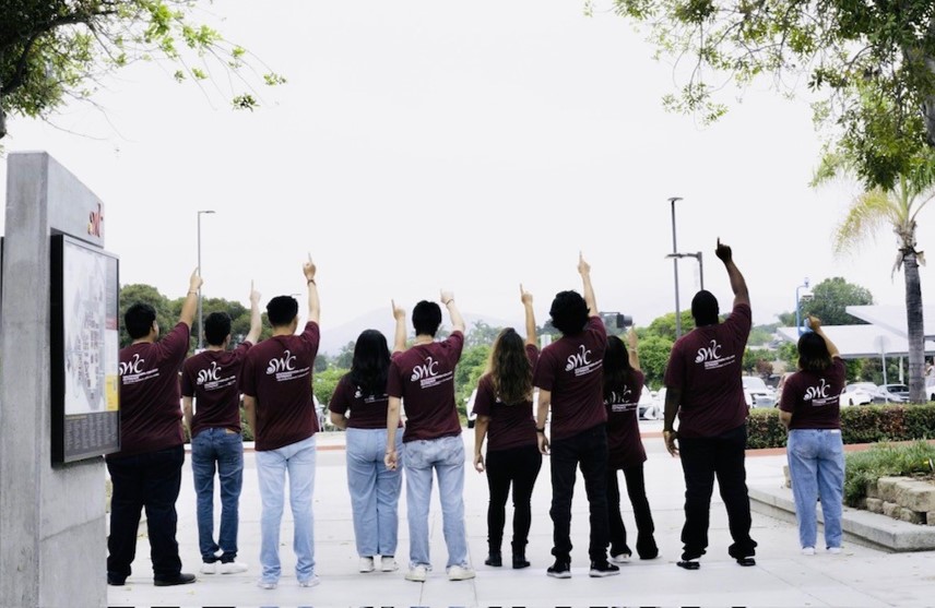 Peers raising hands