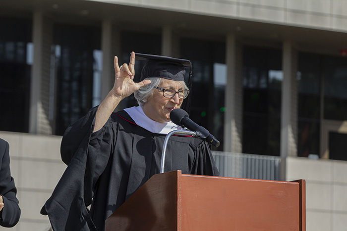 2024 Honorary Degree Recipient, Angelina "Angie" Stuart, signing "I love you" in American Sign Language at the afternoon Commencement Ceremony. 2024 Honorary Degree Recipient, Angelina "Angie" Stuart, signing "I love you" in American Sign Language at the afternoon Commencement Ceremony.