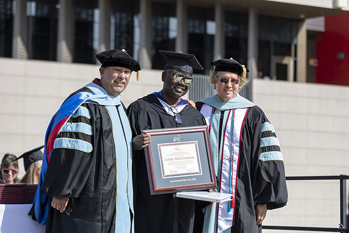 2025 Honorary Degree Recipient, Jerry McCormick (middle), posing with Dr. Mark Sanchez (left) and Dr. Max Branscomb (right). 2025 Honorary Degree Recipient, Jerry McCormick (middle), posing with Dr. Mark Sanchez (left) and Dr. Max Branscomb (right).