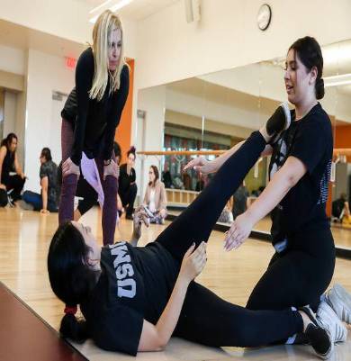 photo of students and faculty in fitness class