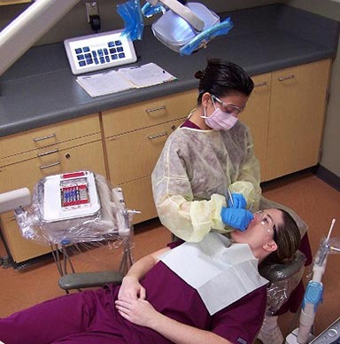 Photo of Dental Hygiene Student with Patient Photo of Dental Hygiene Student with Patient