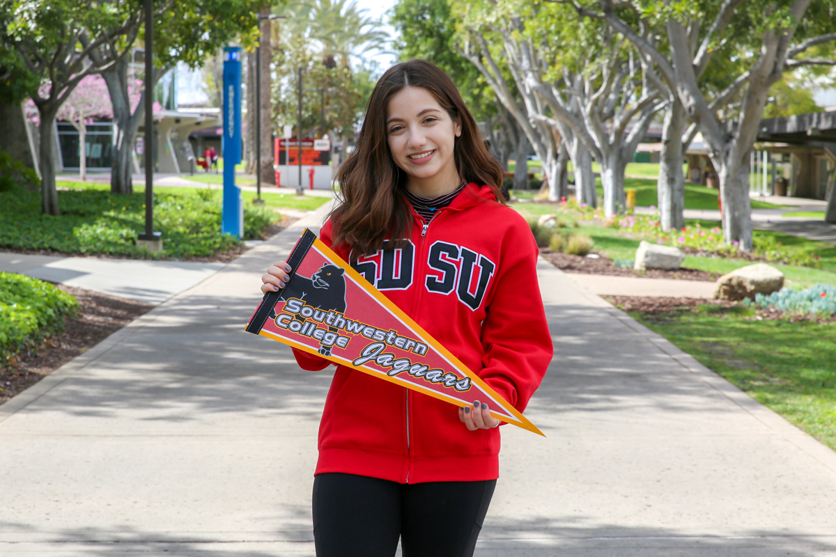 Photo of a Southwestern College student with an SDSU sweater.