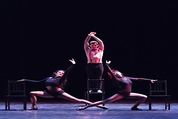 Performance Activities dark photo of a student dance performance