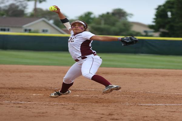 Jaguar athlete pitching softball