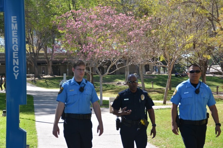 College police officers walking around campus