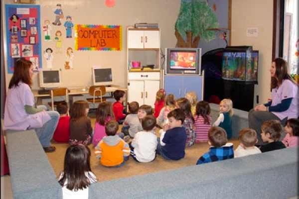 a group of students sitting on the floor in SWC's Child Development Center a group of students sitting on the floor in SWC's Child Development Center