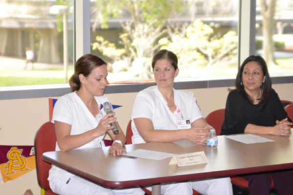 A photo of a discussion panel of two nursing students A photo of a discussion panel of two nursing students