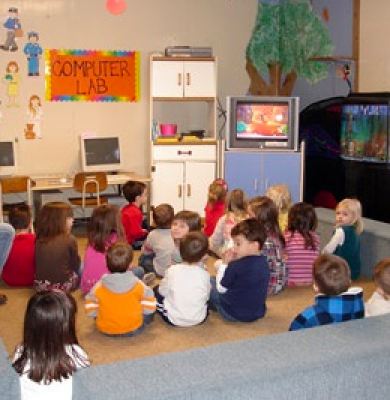 Children at daycare in front of a TV Children at daycare in front of a TV