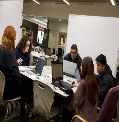 group studying with computers