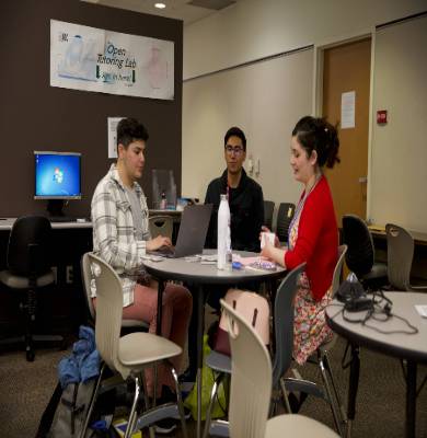 three students studying in ASC